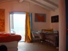 Ferienwohnung Arte, Bosa-schreibtisch Ferienwohnung Arte, Bosa-Schafraum mit Schreibtisch