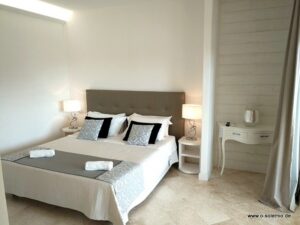 Wohnung 1, Villa Smeralda, Schlafzimmer mit Tür zur Terrasse