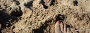 Füße im warmen Sand