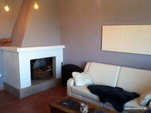 Kamin im Wohnraum Azzurro Vista im Weinberg, Sole im OG