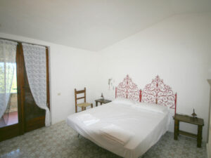 das zweite Schlafzimmer mit Doppelbett